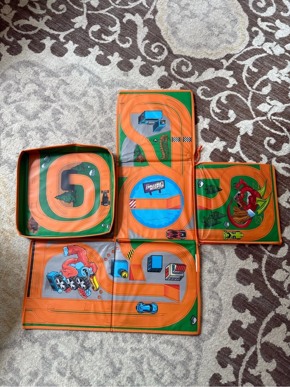 Hot wheels box that unzips as a playmat for cars